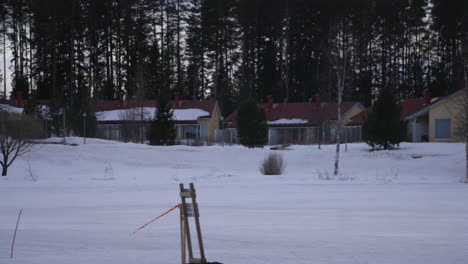 A-cold-snowy-day-in-a-deserted-space-with-trees-and-a-cold-grey-feeling-in-Vuokatti-Finland