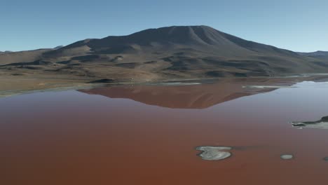 Laguna-Colorada-Red-Salt-Lake-Lagoon-Bolivia,-Aerial-Above-Protected-Wildlife-Sanctuary,-Andean-Landscape,-Potosi-Earth-Wonder