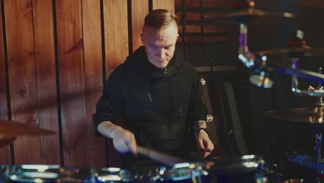 drummer in a music studio