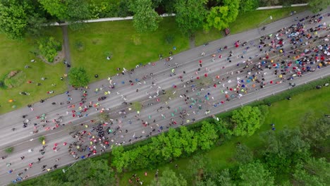 people gathering at start of reykjavik marathon on closed street, top down