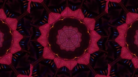 bucle vj: caleidoscopio giratorio y brillante que crea patrones geométricos aleatorios en rojo, naranja y azul