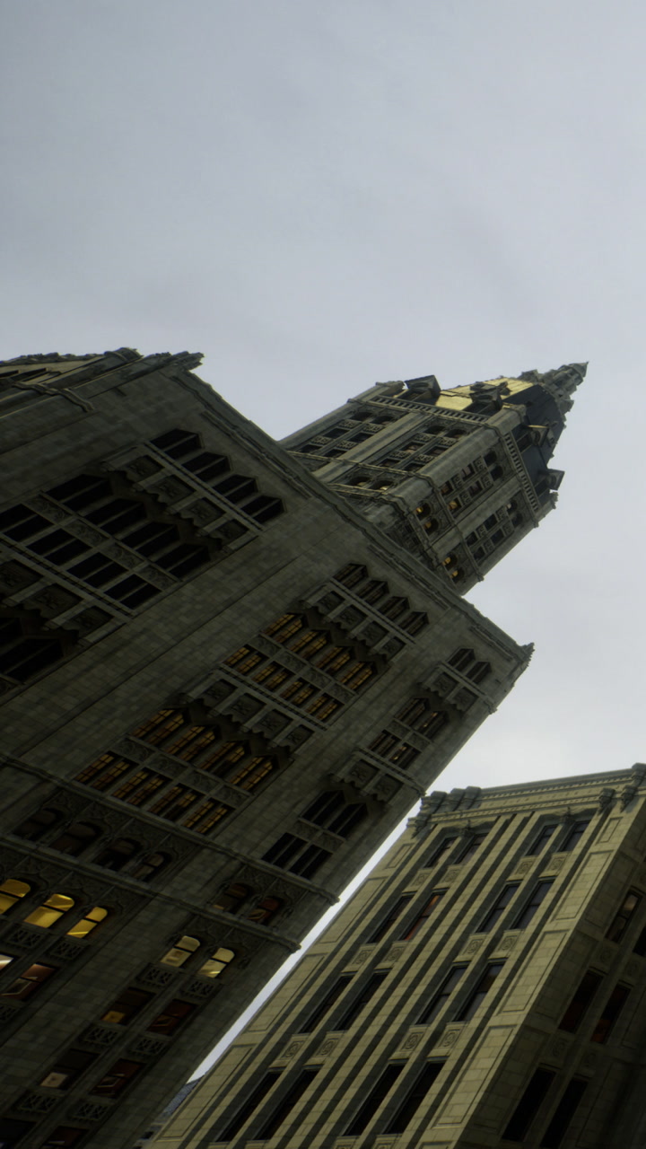 Stunning view of towering architecture reaching for the cloudy sky above