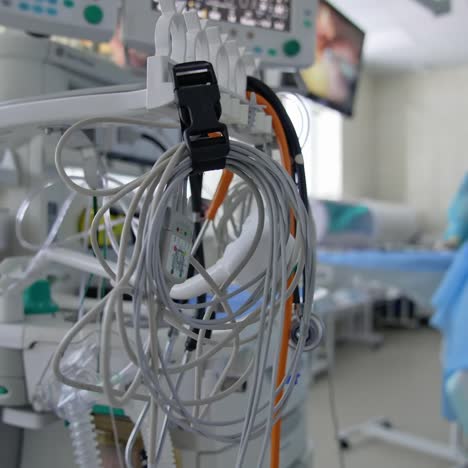 operating room interior in modern clinic. surgeons performing operation on patient at the hospital