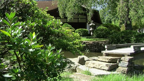 Japanese-garden-with-footbridge-and-house