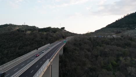 Aerial-of-traffic-driving-over-busy-multi-lane-overpass