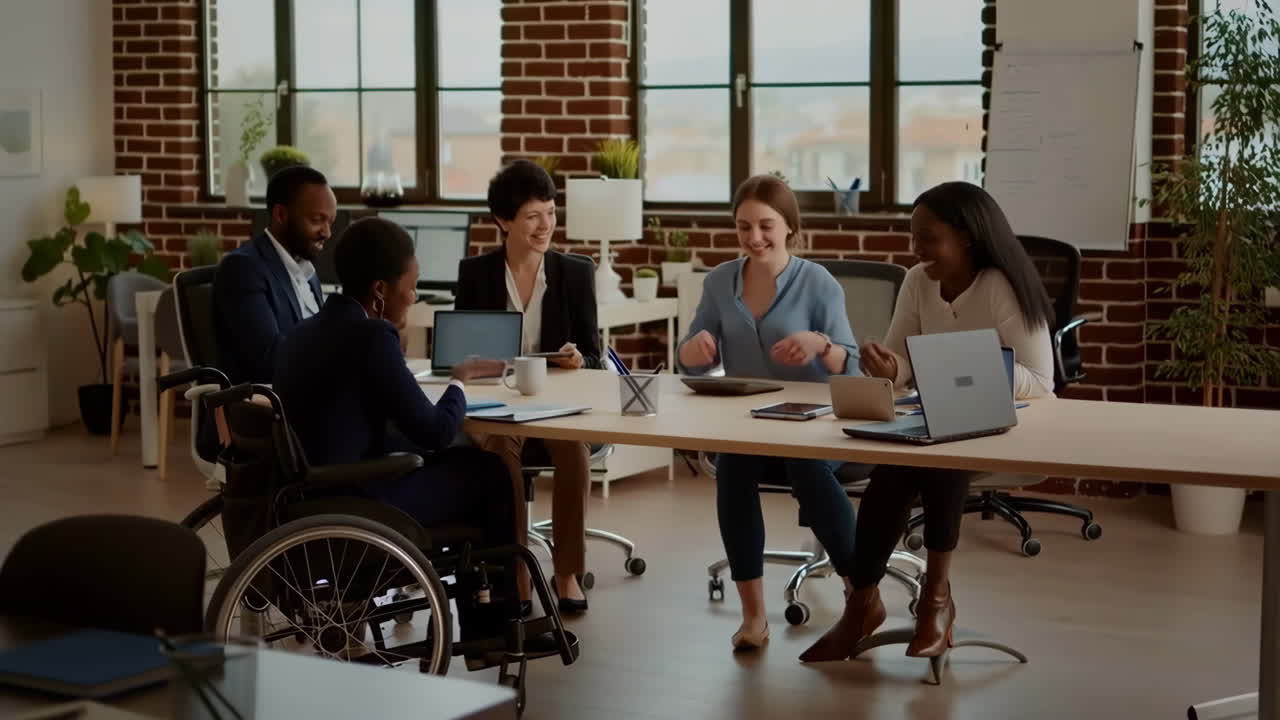 Diverse business team collaborating in an inclusive office meeting