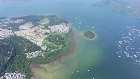 Hong-Kong-Tseng-Tau-Tsuen-waterfront-houses,-Aerial-view