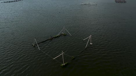 fishing nets and structures in a lake