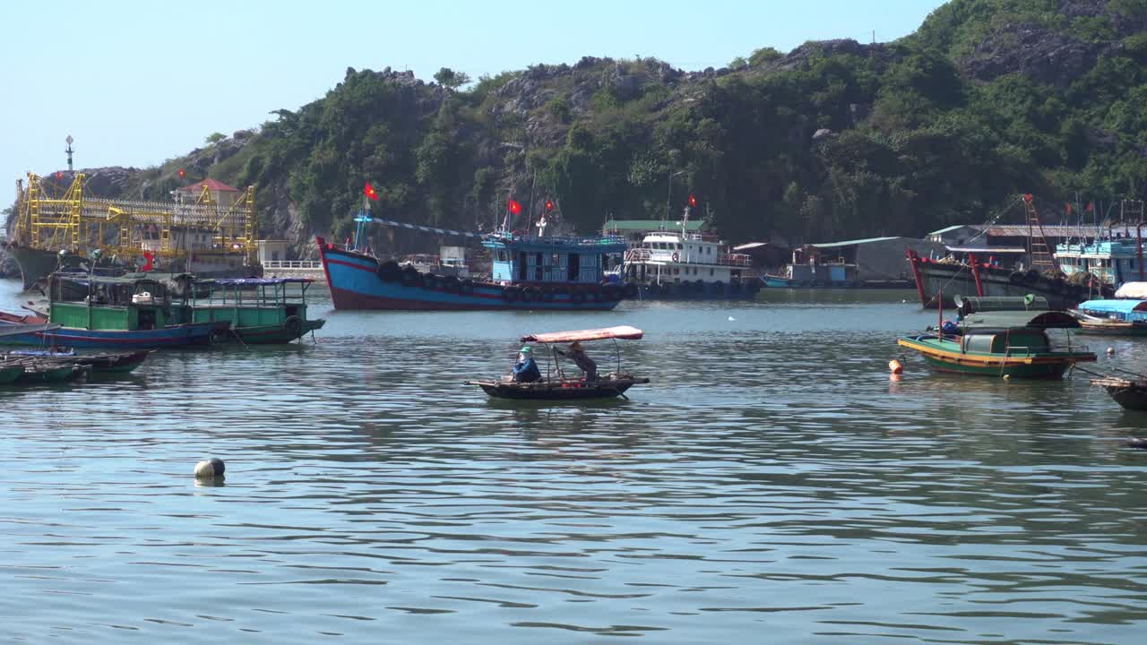 Fishing boat on the midlle of port
