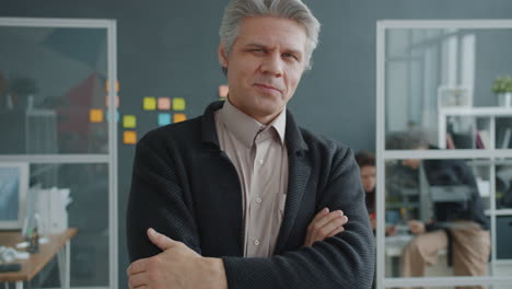 confident businessman in office