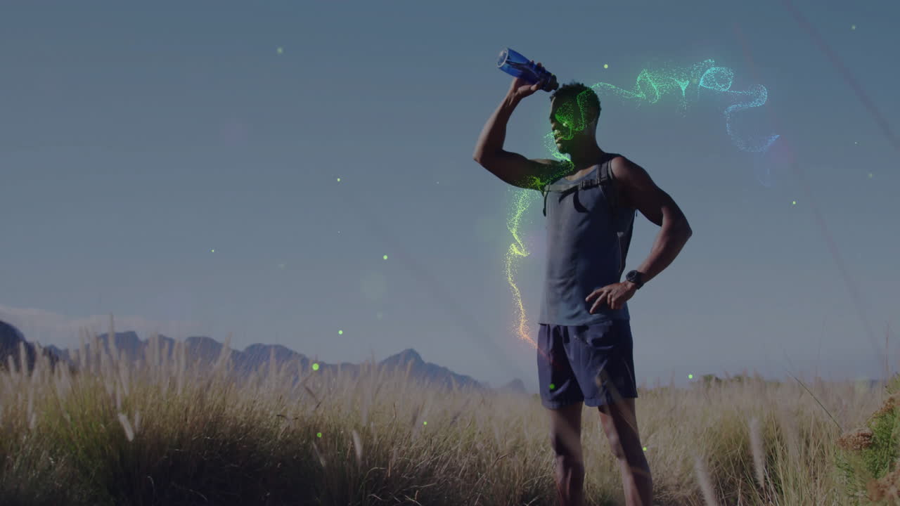Outdoor athlete pouring water over head in mountain grassland, showing health hydration chart