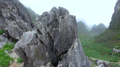 slow reveal of a winding road in the misty mountains of northern vietnam