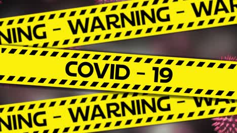 animation of the words covid-19 and warning written on tape