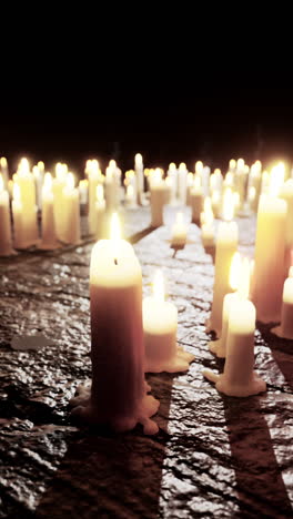 many lit candles at night