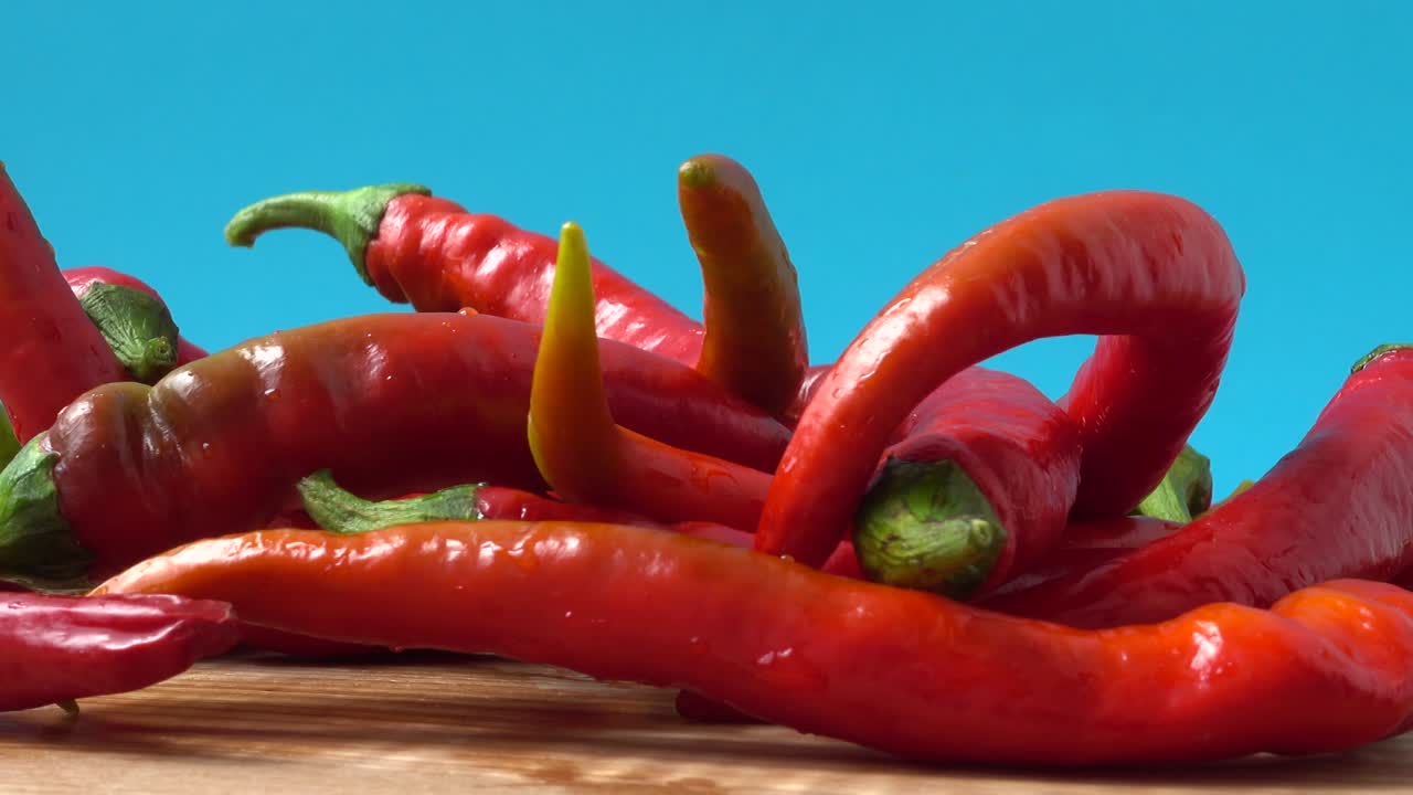 Red chilli, pepper. Shooting in the movement