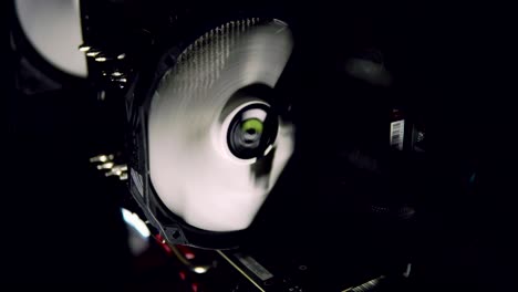 white computer fan cooling dark computer