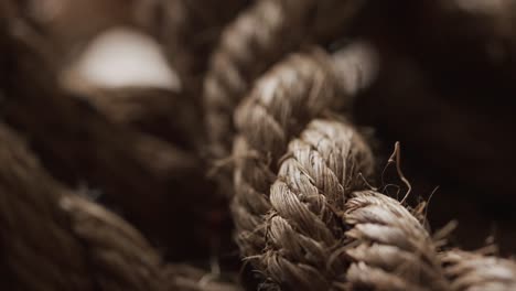 Micro-video-of-close-up-of-grey-woolly-threads-with-copy-space