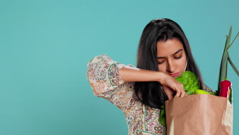 Ecology-lover-holding-shopping-bag-with-natural-produce