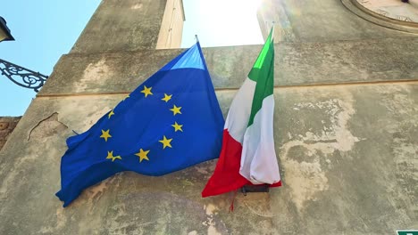 flags waving in the naples sunlight