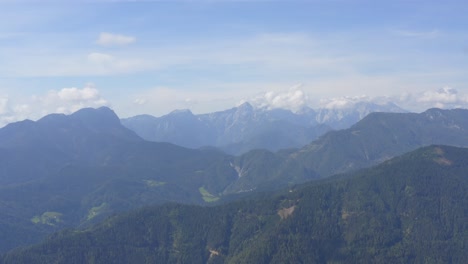 Majestic-aerial-view-of-Peca,-highest-mountain-of-eastern-Karawanks