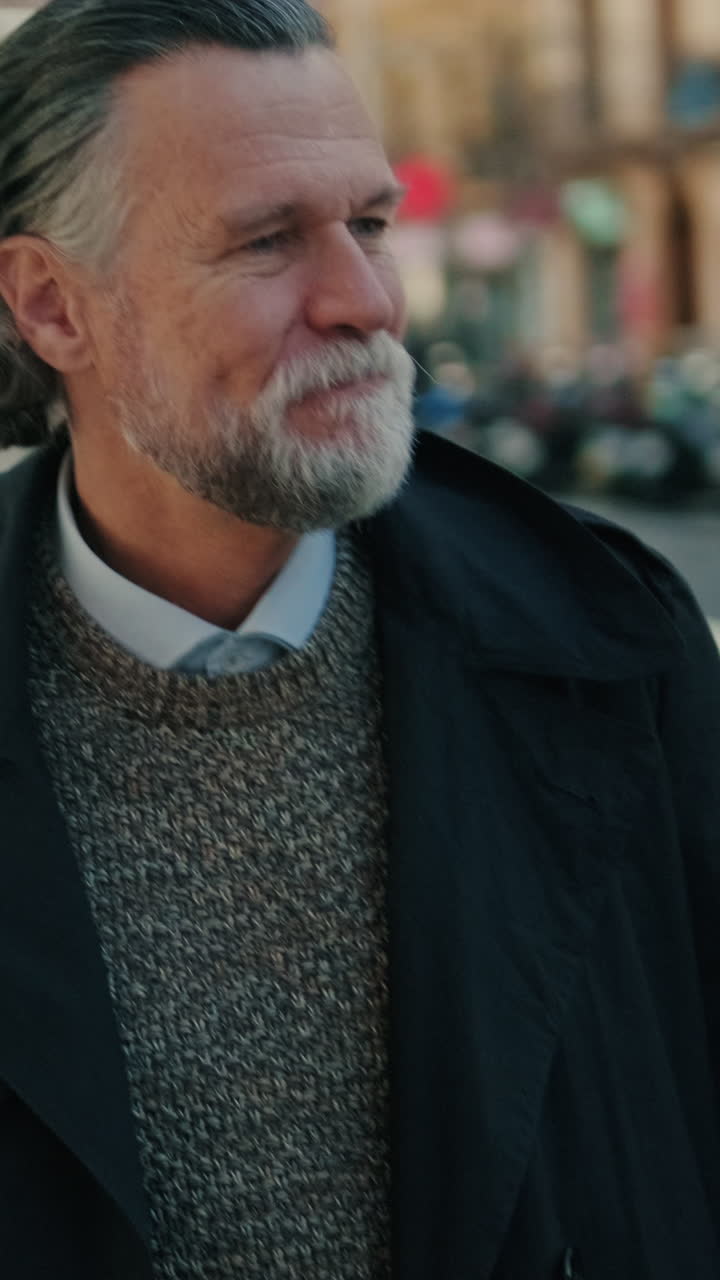 Smiling Senior Man Walks Down City Street