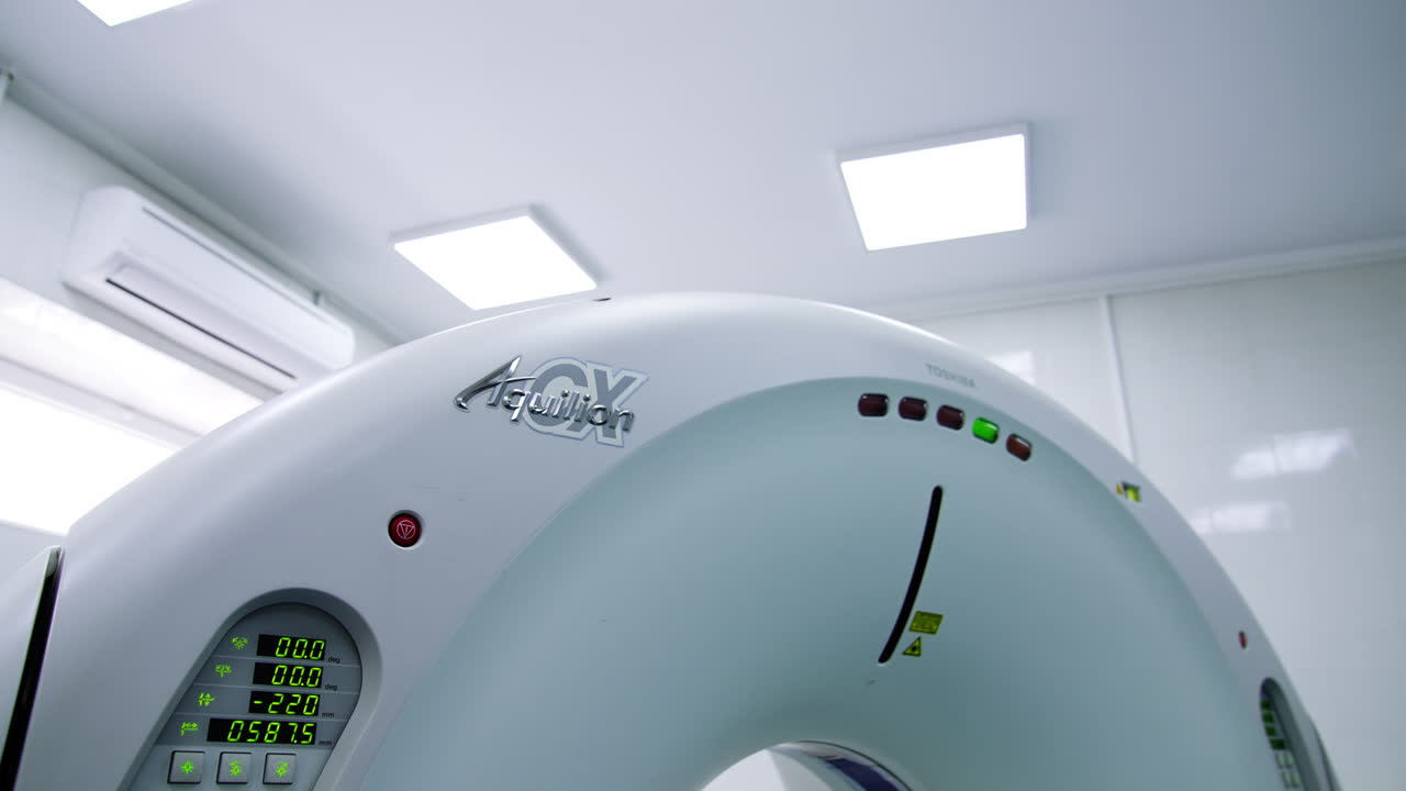 Computed tomography scanner in a hospital room. Toshiba equipment for magnetic resonance imaging. Low angle view.
