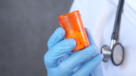 doctor holding a pill bottle