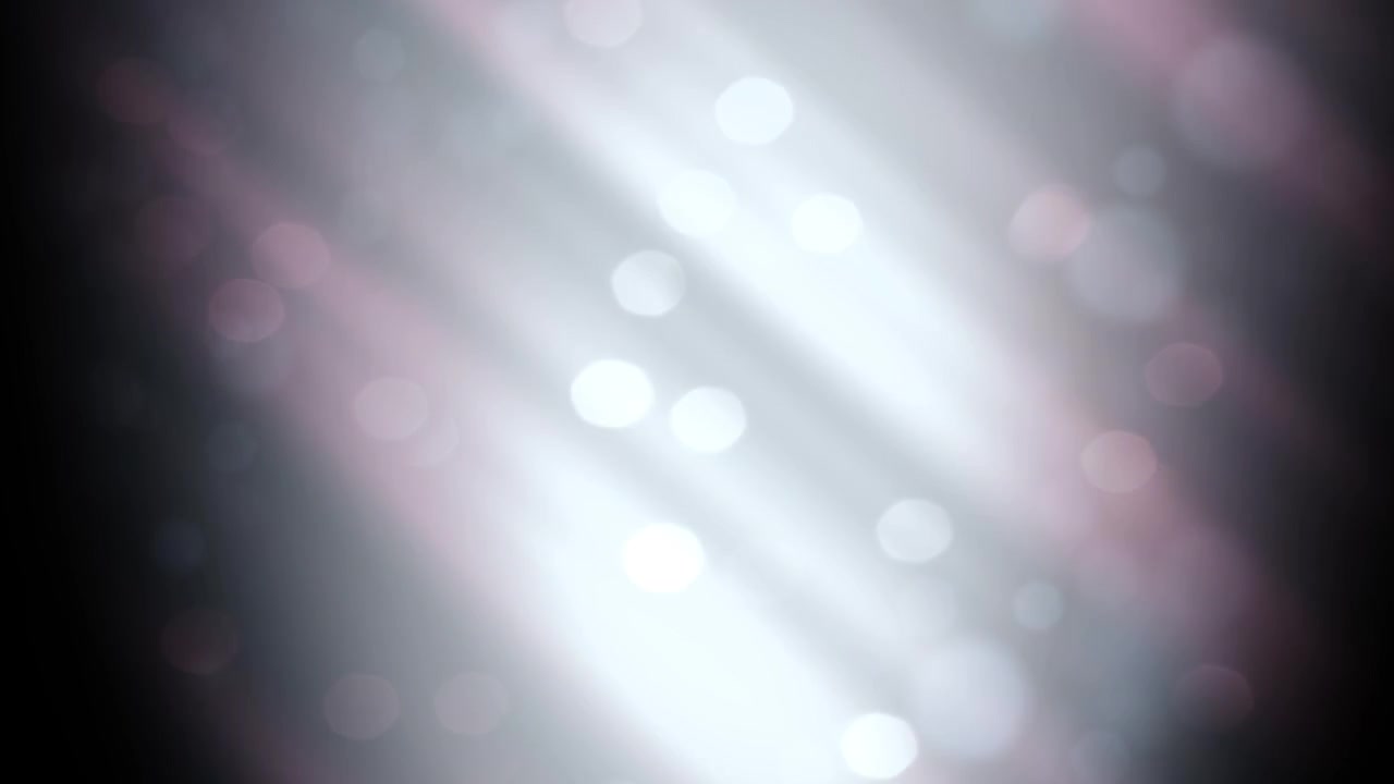 Shimmering Bokeh Light Rays on a Dark Abstract Background