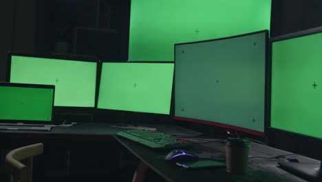 multiple monitor green screen setup in a home office