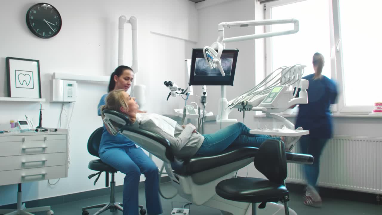 Time lapse view of stomatologists doing their work in dentist's