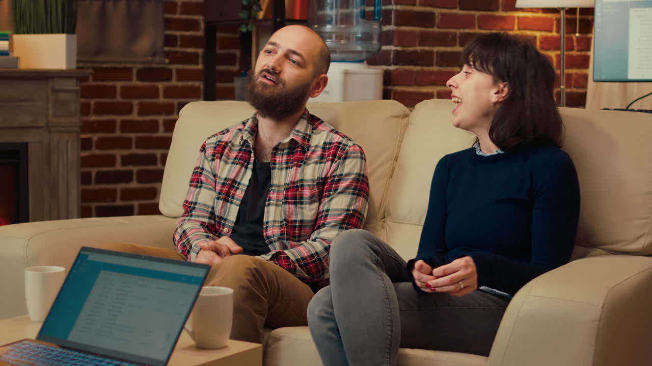 Man and woman talking to specialist at couple therapy session