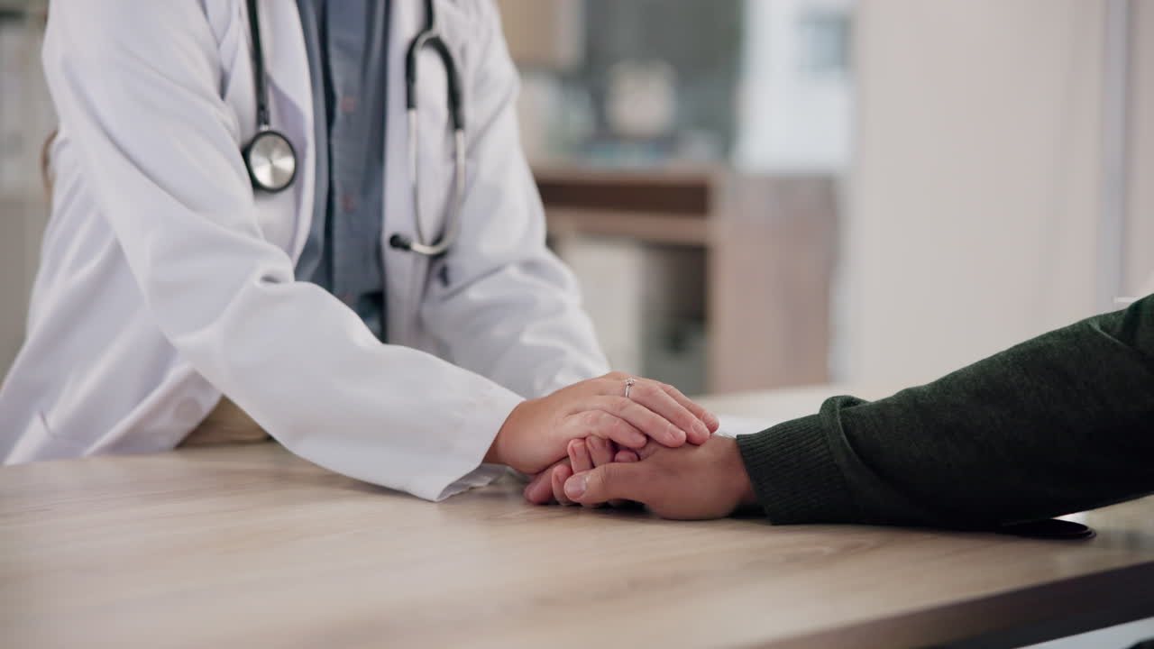 Doctor offering support to patient