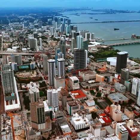 vast scenery of miami cityscape with multiple piers on the water. wide array of architecture in the modern usa city.