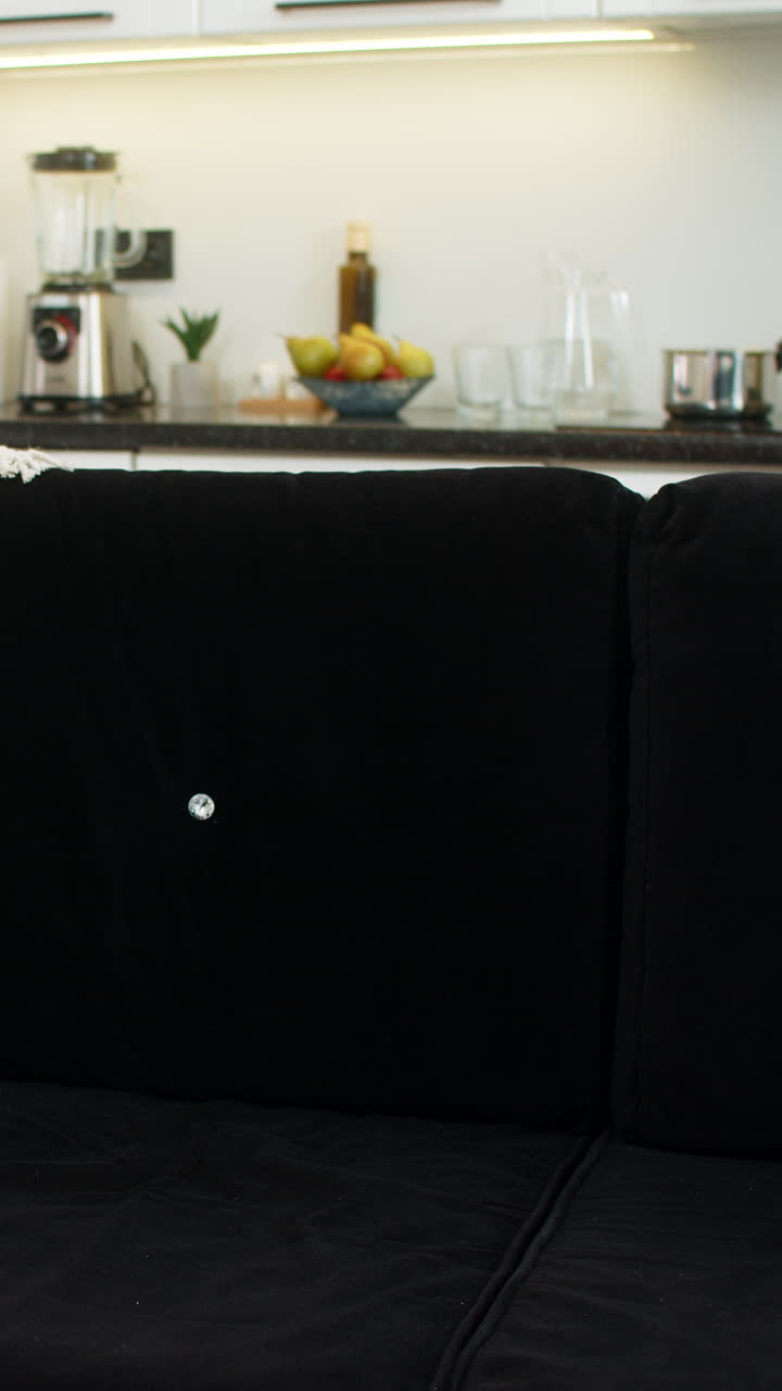 Young woman unwinds and rests takes slow breaths and finds calm posture with gentle smile and ease