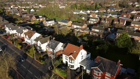 aerial view expensive english middle class houses in rural suburban neighbourhood