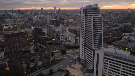 Establishing-Aerial-Drone-Shot-of-Leeds-City-Centre-and-Bridgewater-Place-Before-Stunning-Sunrise-in-Low-Light