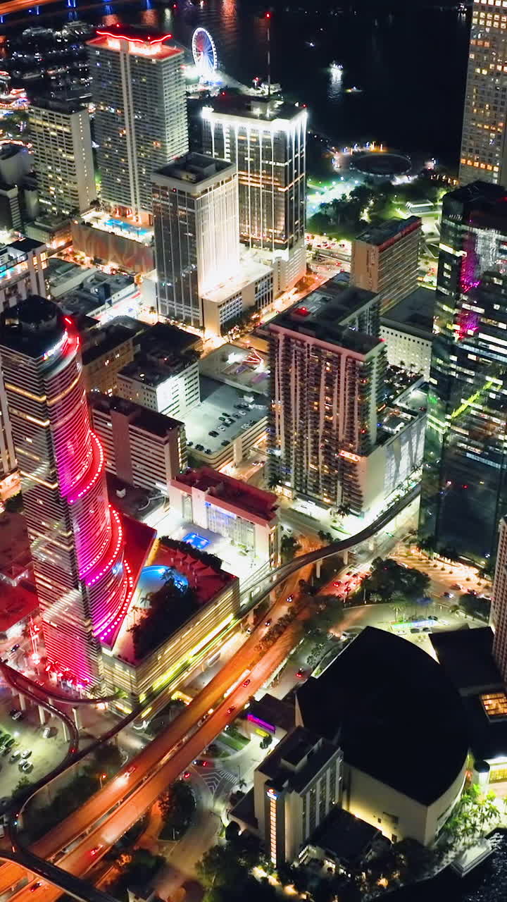 Miami Tower. Aerial view of downtown office district of Miami Brickell in Florida, USA at night. High commercial and residential skyscraper buildings