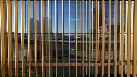 Building-exterior-details-and-skyscrapers-reflecting-in-glass-window