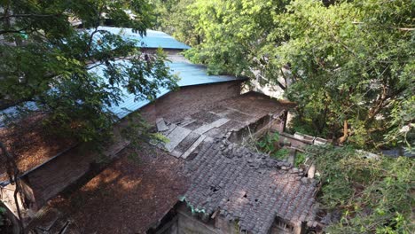 UAV-flies-over-the-roof-of-the-village-in-the-city