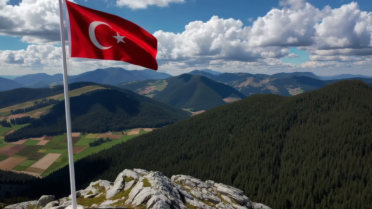 Turkish Flag on Mountain Peak with Scenic Valley View