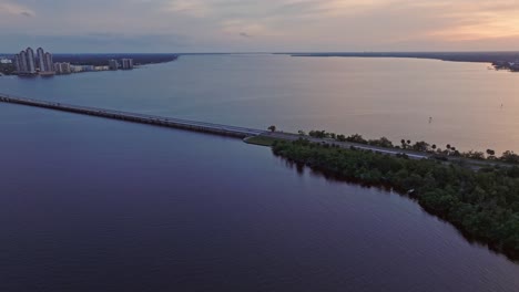 Aerial-view-of-Fort-Myers-Bridge-over-the-ocean-in-Florida,-USA