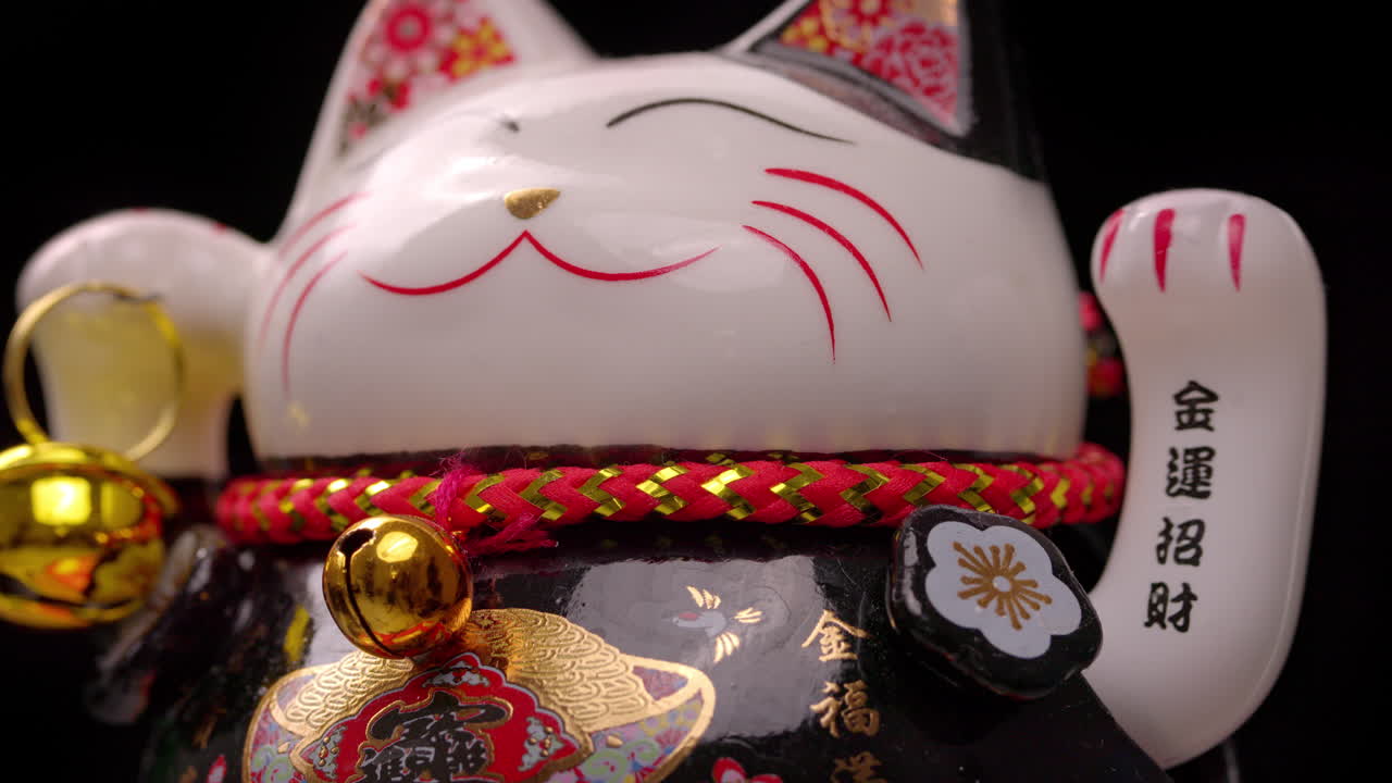 el gato de la suerte manejo agita