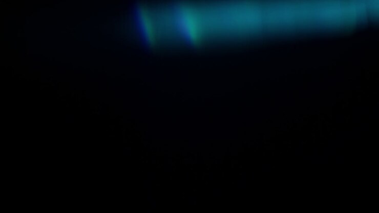 Abstract glass light leaks reflections on black background