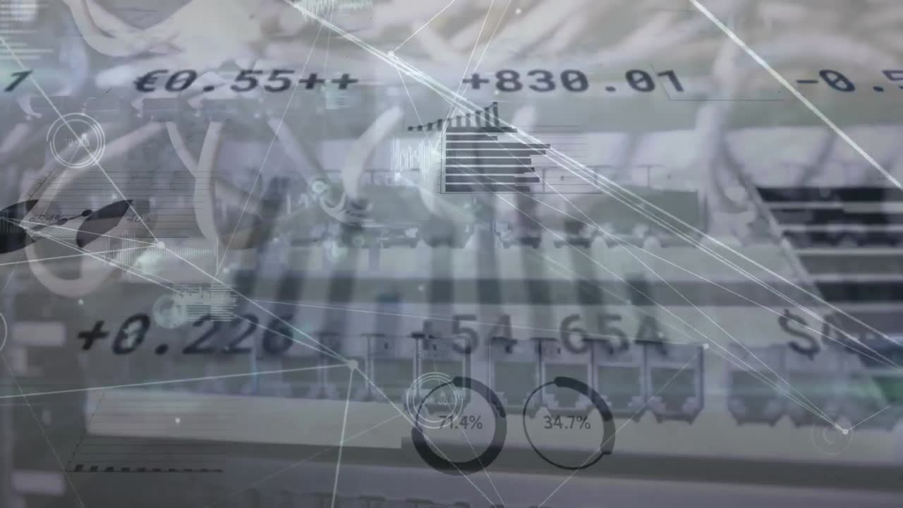 컴퓨터에 연결된 케이블을 통해 통화 기호와 숫자를 가진 여러 그래프의 애니메이션