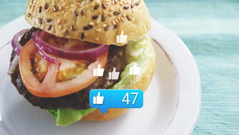 receiving social media likes, burger with sesame seed bun on white plate