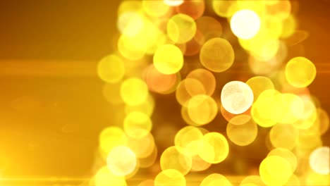 beautiful golden christmas tree lights flickering and turning close-up in blur bokeh on yellow background. looped 3d animation. merry christmas and happy new year concept.