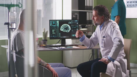 doctor consults with patient with possible brain related issues