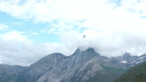 low clouds covering stetind mountain in narvik, nordland county, norway