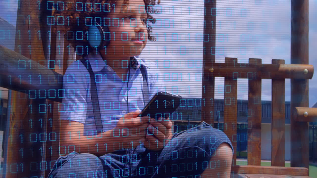Animation of data processing over biracial boy using smartphone