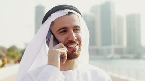 man talking on phone in dubai